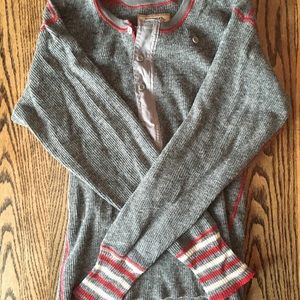 Brand new Stanfield with red and white sleeves. Unworn.